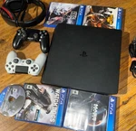 Sony Playstation 4 Slim 1TB Bundle - 9 Games Controllers Headset Low Firmware Used. Price: $150.00.