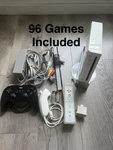 Nintendo Wii RVL-001 With Tons Of Games Used. Price: $140.00.