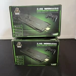 Two Sets Of 2.4G Wireless Gamer Controllers Complete Open Box Classic Games. Price: $15.00.