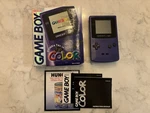 Nintendo Gameboy Color Console - Grape With Box And Manuals Used. Price: $200.00.