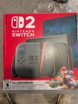 Nintendo Switch 2 Mario Kart World Bundle W/ Donkey Kong Bananza Physical Copy Open. Price: $450.00.