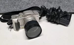 Panasonic Lumix DMC-FZ1 Digital Camera W/ Battery, Charger And Kenko Lens Works Used. Price: $39.99.