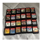 Nintendo Switch Console W/ Game Cartridge Lot + Charger & Carrying Case Used. Price: $550.00.