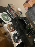 Microsoft Xbox Console With Controller, Cables & 9 Games Used. Price: $150.00.