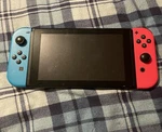 Nintendo Switch Stand Included, Right Connector Is Broken But Works. Used. Price: $125.00.