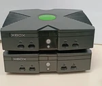 Microsoft Original Xbox Consoles Lot 2 For Parts Repair Only Seal Intact. Price: $135.00.