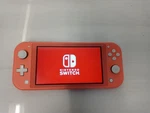 Nintendo Switch Lite HDH-001 Handheld Game Console Only Coral Pink Used. Price: $135.00.