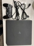 Sony Playstation 4 Slim 1TB Console, Oem Controllers, All Cables Used. Price: $140.00.