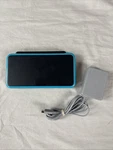 Nintendo New 2DS Xl Turquoise Black Handheld Game Console + Charger JAN-001 Used. Price: $259.99.