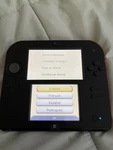 Nintendo 2DS Crimson Red Handheld System Console Model FTR-001. Tested Used. Price: $99.99.