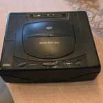 Sega Saturn MK-80000 Black Console W/ Controllers, Cables, Night Warriors Disc Used. Price: $225.00.