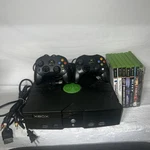 Microsoft Original Xbox Console Bundle With 7 Games And Oem Cables 2 Controllers Used. Price: $150.00.