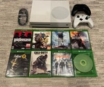 Microsoft Xbox One 1681 1TB White Video Game Console Bundle Open. Price: $165.00.