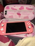 Nintendo Switch Lite Handheld Game Console HDH-001 Coral Pink W/ Charger, Case Used. Price: $135.00.
