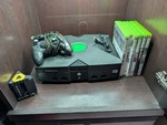 Xbox Original With Remote And Some Games Used. Price: $115.00.