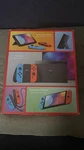 Nintendo Switch Oled Model W/ Neon Red & Blue Joy-con New. Price: $300.00.