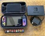Nintendo Switch Console Original & 9 Games W/charger Carrying Case Mod HAC-001 Used. Price: $479.99.