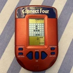 Connect Four Electronic Hand-held Game Milton Bradley Hasbro 2002 Tested Works Used. Price: $6.99.