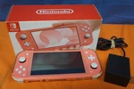 Nintendo Switch Lite 32 Gb Gaming Console - Coral W/box & Cover Used. Price: $144.99.