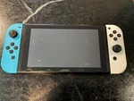 Used Nintendo Switch With Pro Controller Excellent Condition. Price: $159.99.