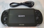 Sony Playstation 1000 Psvita System Console W/ Charger Cable Used. Price: $199.95.
