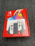 New Nintendo Switch Oled Console Gaming System HEG-001 Black/white Bundle. Price: $329.99.