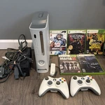 Microsoft Xbox 360 White Fat Console 60GB Tested Working W/5 Games & 2 Remotes Used. Price: $149.95.
