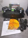Original Microsoft Xbox Video Console Tested Works W/ 2 Controllers 6 Games Used. Price: $154.99.