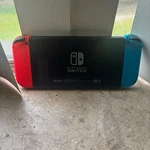 Nintendo Switch Console With Neon Red & Blue Joy-con, Hdmi, Wi-fi Capability Used. Price: $100.00.