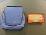 Nintendo Dsi Handheld System Orange W/charger, Cases, Games More! Used. Price: $150.00.