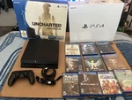 Sony Playstation PS4 500GB Uncharted Collection Bundle In Box With 10 Games Used. Price: $230.00.