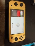 Nintendo Switch Lite Hyrule Edition Zelda Special Gold Console + Charger Used. Price: $150.00.