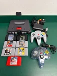 Nintendo 64 Console Bundle W/ Red Memory Expansion Oem Controller (EZ5002294) Used. Price: $199.99.