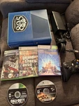 Microsoft Xbox 360 Special Edition Blue Bundle 500GB Console W/ Games Used. Price: $149.99.