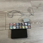 Nintendo Dsi Xl Handheld Console With 14 Games Stylus Charger See Descriptio Used. Price: $125.00.