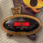 20Q Questions Music Rock & Pop Electronic Handheld Game By Radica-with Batteries New. Price: $17.99.