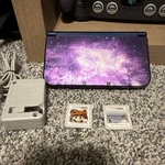 Nintendo 3DS Xl Galaxy Edition Handheld Console System Purple W/ Charger & Games Used. Price: $284.95.
