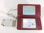 Nintendo Dsi Xl Burgundy Tested Working Charges Discolored Screens Wear Used. Price: $97.00.