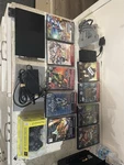 Sony Playstation Console Lot Sealed Dualshock 2, Multitap, Dance Pad, 17 Games Used. Price: $650.00.