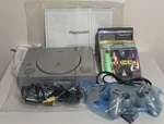 Sony Playstation Console Bundle W/ Controller, Memory Card, Racing, Sports Games Open. Price: $250.00.