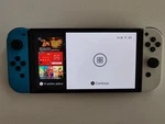 Nintendo Switch Oled Model HEG-001 Handheld Console 64GB White Usato. Price: $290.63.