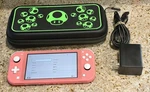 Coral/pink Nintendo Switch Lite 32GB Console W/ Charger & Case! Used. Price: $124.88.