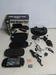 Sony Psp 1003 System W/ Grips & Mega Memory Pack Accessories Tested + Used. Price: $137.45.