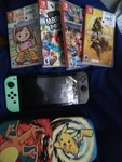Nintendo Switch 32 Gb Console With Gray Joy-con 4 Games Used. Price: $260.00.