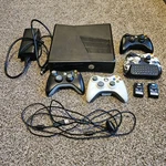 Microsoft Xbox 360 Black Console Wi-fi Hdmi 4 Controllers Used. Price: $140.00.