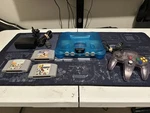 Restored Ice Blue Nintendo 64 Console Bundle New Shell, With Controller/ Games Used. Price: $154.89.