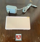 Nintendo Ds Lite Console - Light Coral Pink With Charger And Game Cartridge Used. Price: $60.00.