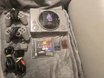 Sony Playstation Gray SPCH-5501 Bundle W/2 CONTROLLERS,2 Memory Cards & Game Used. Price: $70.00.