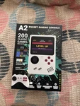 Shockwave A2 Pocket Gaming Console 200 Games, Rechargeable, Tv Output, Players New. Price: $24.50.
