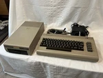 Commodore 64 Console + 1541 Disk Drive Box/accessories: Powers No Video Used. Price: $218.99.